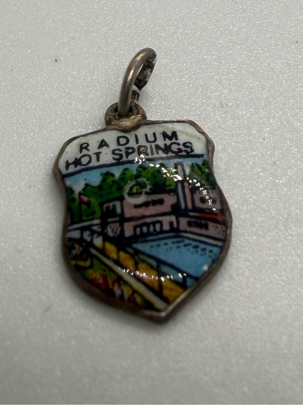 Vintage Radium Hot Springs Enamel Souvenir Shield Charm